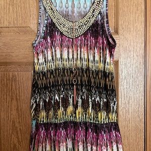 Colorful sleeveless blouse with gathered waist, medium